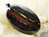 Pendentif : OEIL de FER