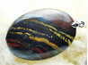 Pendentif : OEIL de FER