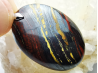 Pendentif : OEIL de FER
